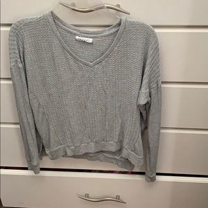 Grey loose hanging long sleev with fitted sleeves